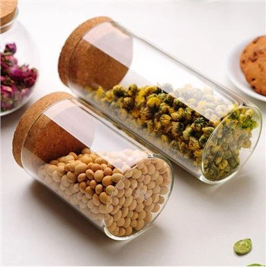 कॉर्क लिड्स के साथ गोल भंडारण जार